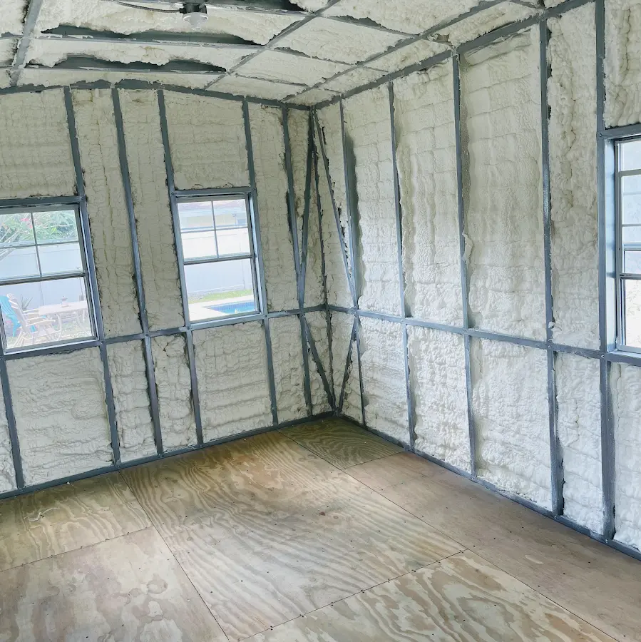 Closed-cell spray foam insulation applied to wall cavities in a residential project in Boxford